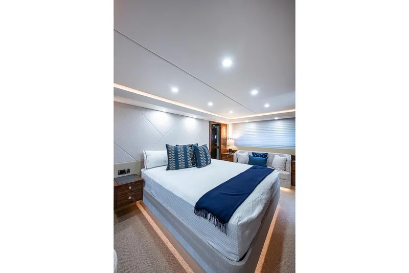Slide: The Image of Luxurious bedroom interior of 2025 Maritimo M75 yacht with elegant decor and ambient lighting. - 101