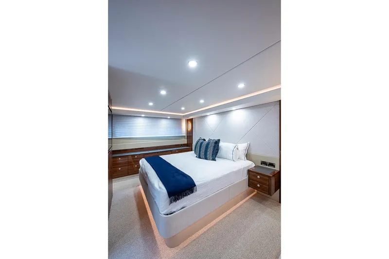 Slide: The Image of Luxurious bedroom interior of 2025 Maritimo M75 yacht with modern design and elegant lighting. - 102