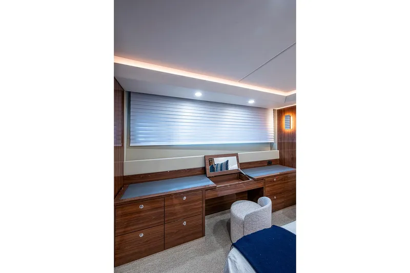 Slide: The Image of Luxurious interior of 2025 Maritimo M75 yacht with elegant wood cabinetry and modern lighting. - 105
