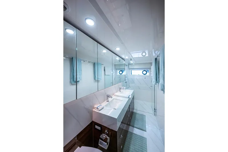 Slide: The Image of Luxurious bathroom in 2025 Maritimo M75 yacht with modern fixtures and elegant design. - 108