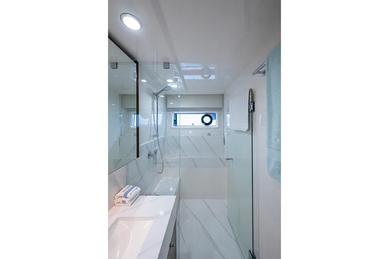 Slide: The Image of Luxurious bathroom in 2025 Maritimo M75 yacht with modern fixtures and elegant design. - 110