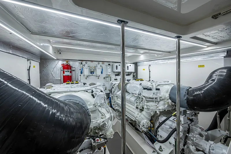 Slide: The Image of Engine room of 2025 Maritimo M75 yacht, featuring advanced machinery and sleek design. - 115