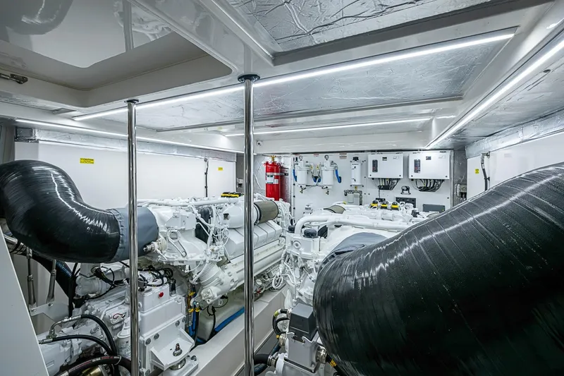 Slide: The Image of Engine room of 2025 Maritimo M75 yacht, featuring advanced machinery and sleek design. - 116