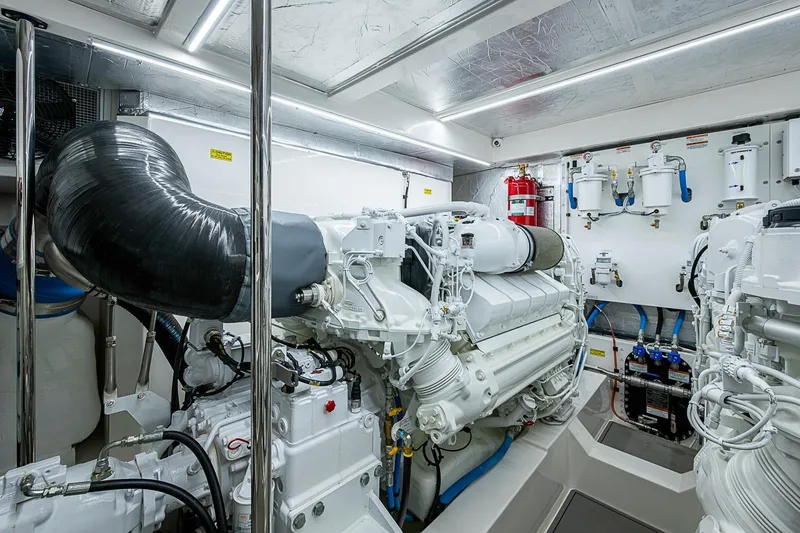 Slide: The Image of Engine room of 2025 Maritimo M75 yacht, featuring advanced machinery and equipment. - 117