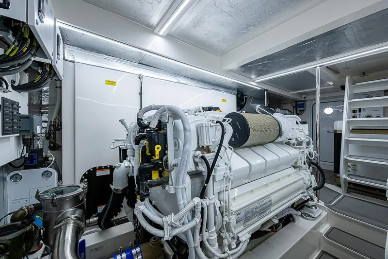 Slide: The Image of Engine room of 2025 Maritimo M75 yacht, showcasing advanced machinery and equipment. - 119