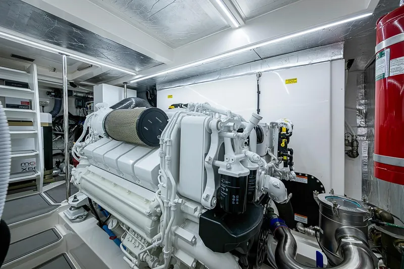 Slide: The Image of Engine room of 2025 Maritimo M75 yacht, showcasing advanced machinery and equipment. - 120