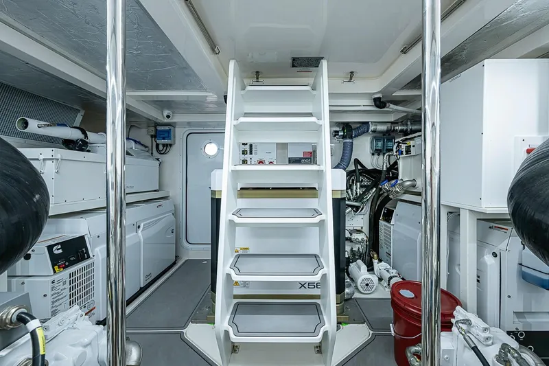 Slide: The Image of Engine room of 2025 Maritimo M75 yacht, featuring modern equipment and sleek design. - 121