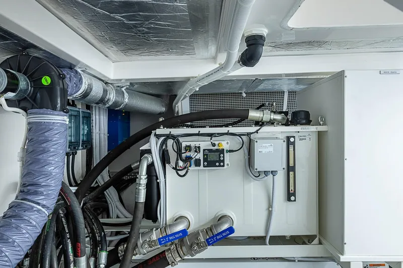 Slide: The Image of Engine room of 2025 Maritimo M75 yacht with advanced mechanical systems. - 123