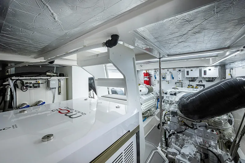 Slide: The Image of Engine room of 2025 Maritimo M75 yacht, showcasing advanced machinery and equipment. - 125