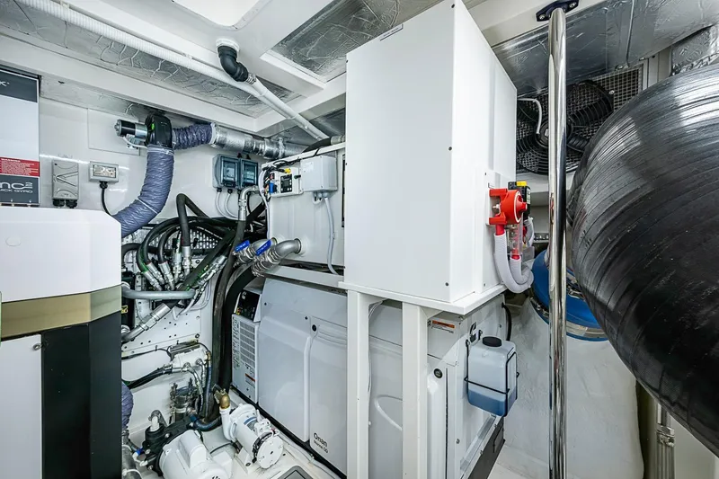 Slide: The Image of Engine room of 2025 Maritimo M75 yacht with advanced mechanical systems. - 128