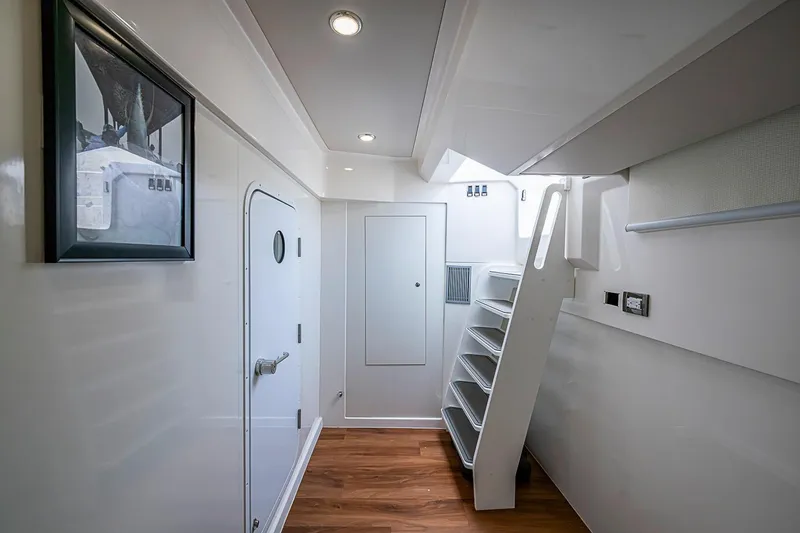 Slide: The Image of Interior of 2025 Maritimo M75 yacht with modern design and wooden flooring. - 134