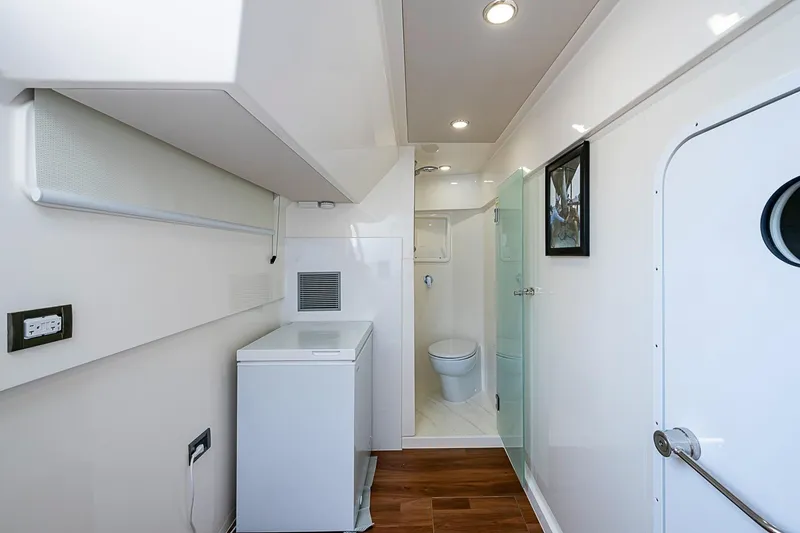 Slide: The Image of Luxurious Maritimo M75 yacht interior bathroom, featuring modern fixtures and sleek design, 2025 model. - 136