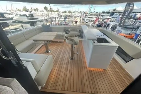 Slide: The Image of Luxurious 2025 Maritimo M75 yacht deck with elegant seating and panoramic views - 25