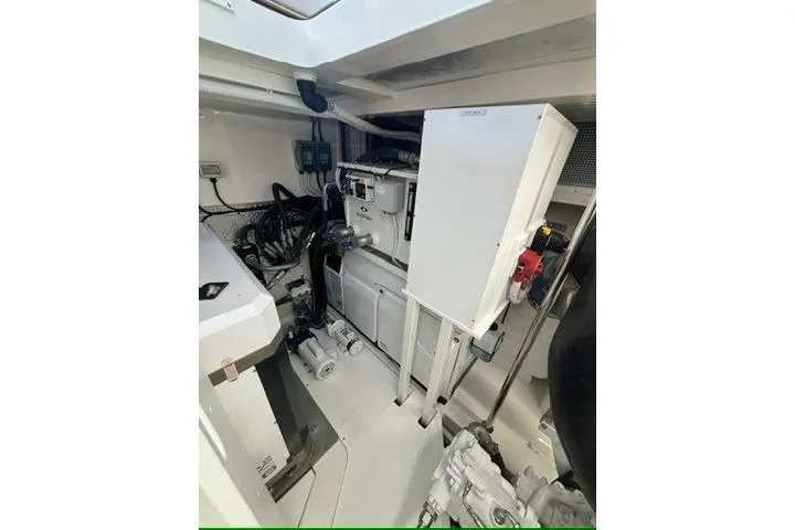Slide: The Image of Engine room of 2025 Maritimo M75 yacht, showcasing 2nd Generator Sleipner Hydraulics for Thrusters and Battery Rack - 29
