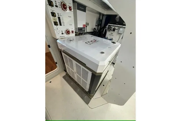 Slide: The Image of Engine room of 2025 Maritimo M75 yacht with MC56 Quick Air Cooled Gyro - 30