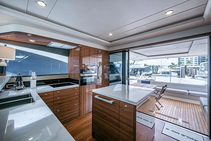 Slide: The Image of Luxurious interior of 2025 Maritimo M75 yacht with modern kitchen and spacious seating area. - 38