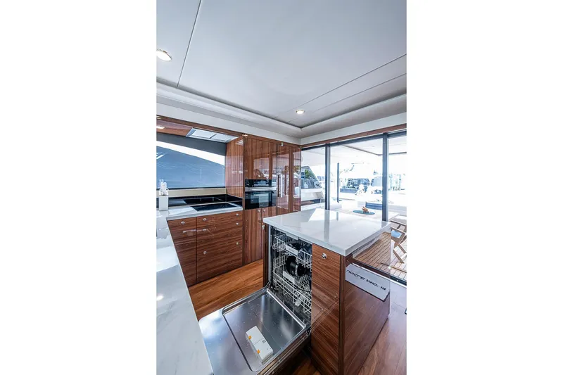 Slide: The Image of Luxurious kitchen interior of 2025 Maritimo M75 yacht with modern appliances and sleek design. - 39