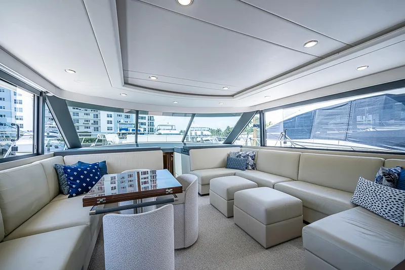 Slide: The Image of Luxurious interior of 2025 Maritimo M75 yacht with elegant seating and panoramic windows. - 40