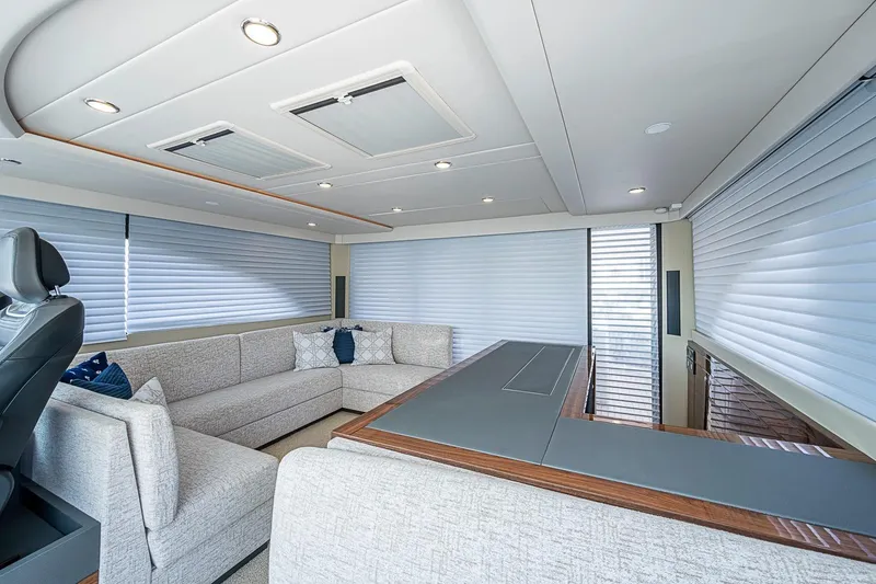 Slide: The Image of Luxurious interior of 2025 Maritimo M75 yacht with modern seating and sleek design. - 53
