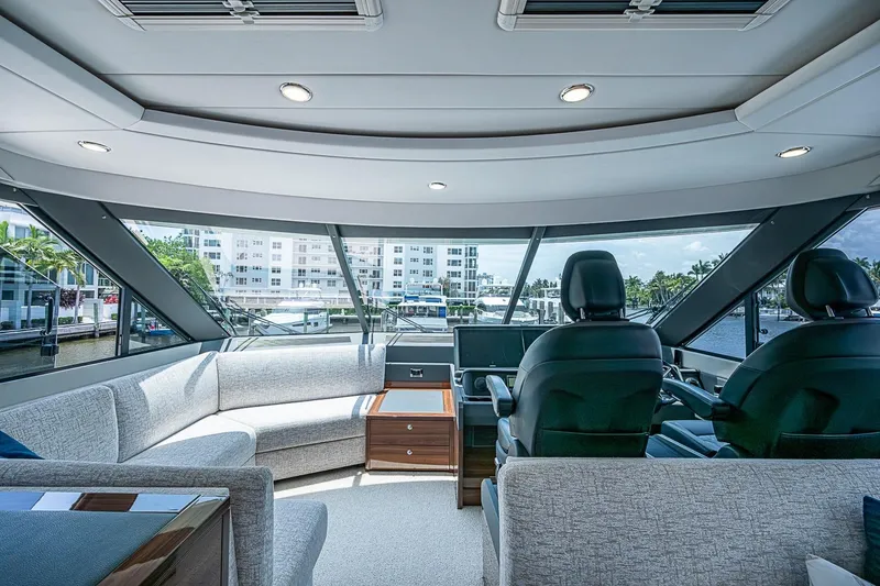 Slide: The Image of Luxurious interior of 2025 Maritimo M75 yacht with panoramic windows and plush seating. - 59