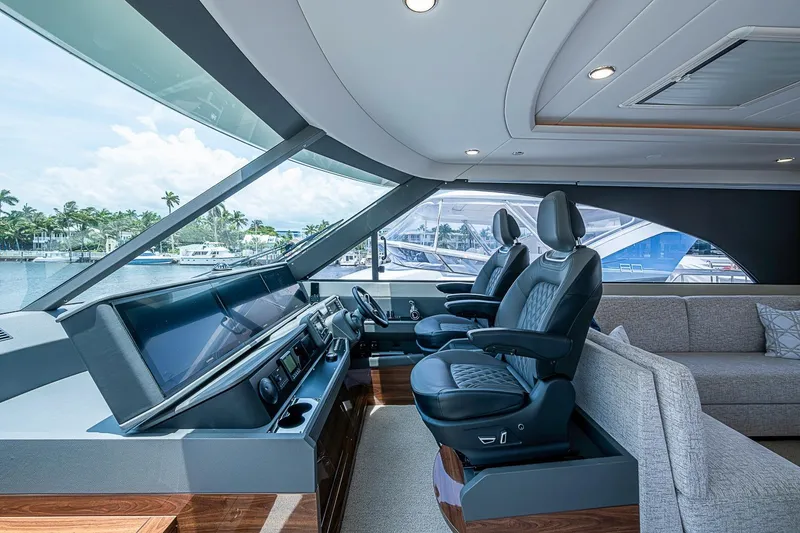 Slide: The Image of Luxurious interior of 2025 Maritimo M75 yacht with modern helm and plush seating. - 62