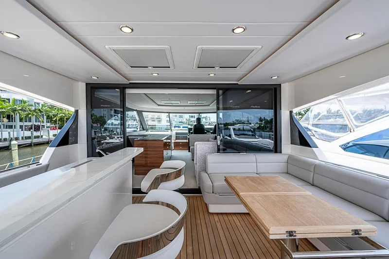 Slide: The Image of Luxurious interior of 2025 Maritimo M75 yacht with modern seating and dining area. - 66