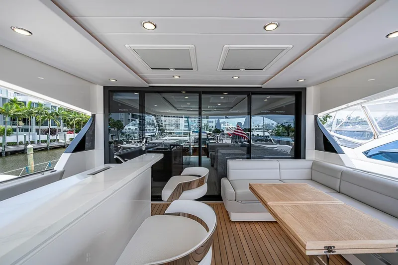 Slide: The Image of Luxurious 2025 Maritimo M75 yacht interior with sleek seating and modern design. - 67