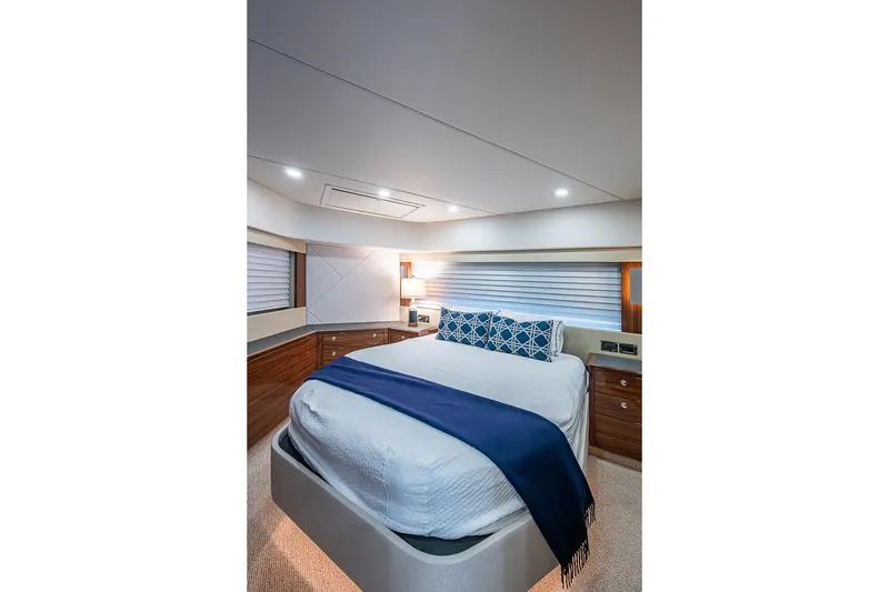 Slide: The Image of Luxurious bedroom interior of 2025 Maritimo M75 yacht with elegant decor. - 85