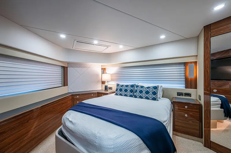 Slide: The Image of Luxurious bedroom interior of 2025 Maritimo M75 yacht with modern design and elegant furnishings. - 86