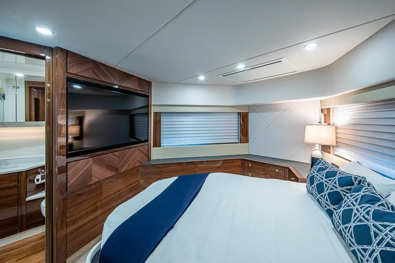 Slide: The Image of Luxurious 2025 Maritimo M75 yacht bedroom with modern decor and ambient lighting. - 87