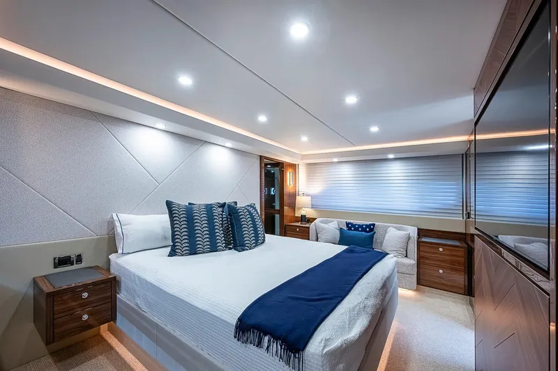 Slide: The Image of Luxurious bedroom interior of 2025 Maritimo M75 yacht with modern design and elegant furnishings. - 98