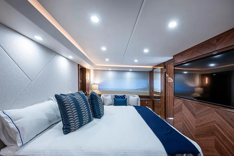 Slide: The Image of Luxurious bedroom interior of 2025 Maritimo M75 yacht with modern design and elegant furnishings. - 99