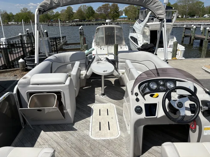 Slide: The Image of Interior view of a 2018 G3 V322 SS pontoon boat at dock. - 16