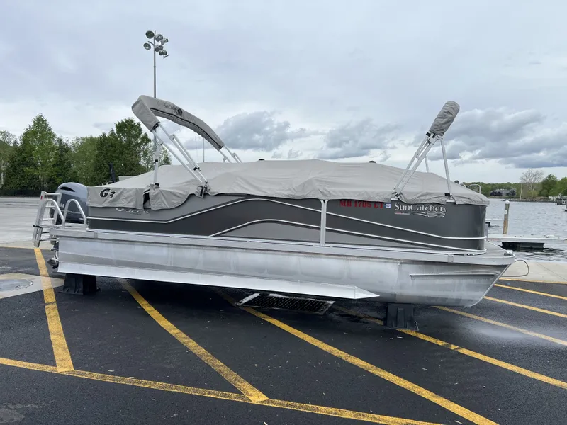Slide: The Image of 2018 G3 V322 SS pontoon boat with cover on parking lot. - 19