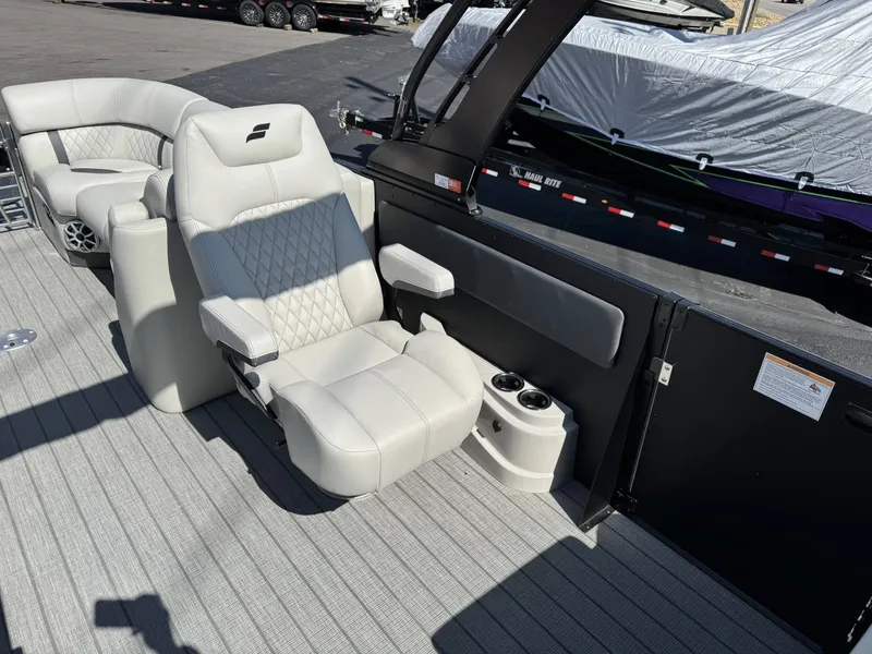 Slide: The Image of Luxurious seating area in Starcraft RX 25 R DH boat, model 2026. - 13