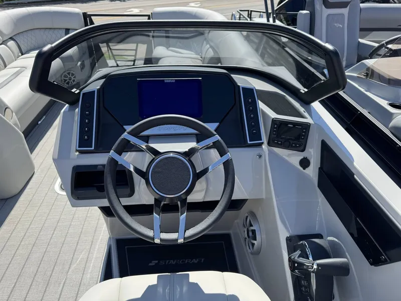 Slide: The Image of Cockpit of Starcraft RX 25 R DH boat, model year 2026. - 23