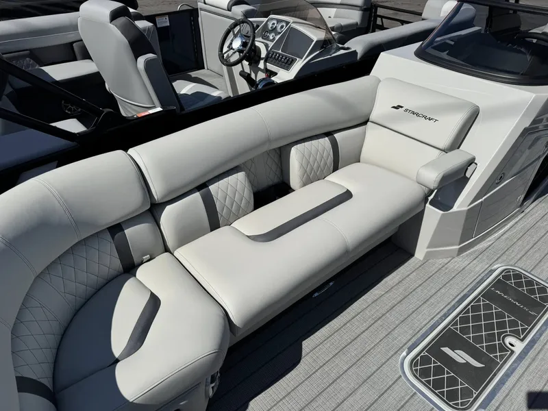 Slide: The Image of Luxurious seating in the 2026 Starcraft RX 25 R DH boat. - 24