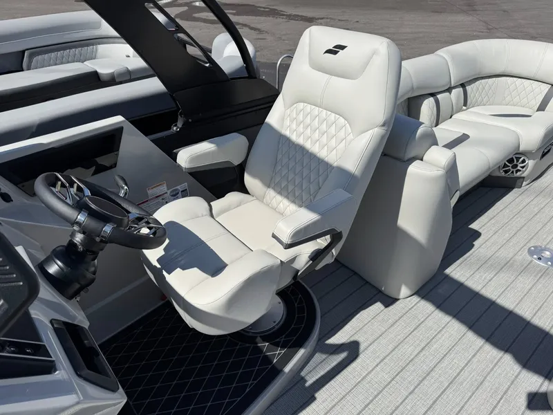 Slide: The Image of Luxurious interior of the 2026 Starcraft RX 25 R DH boat. - 25