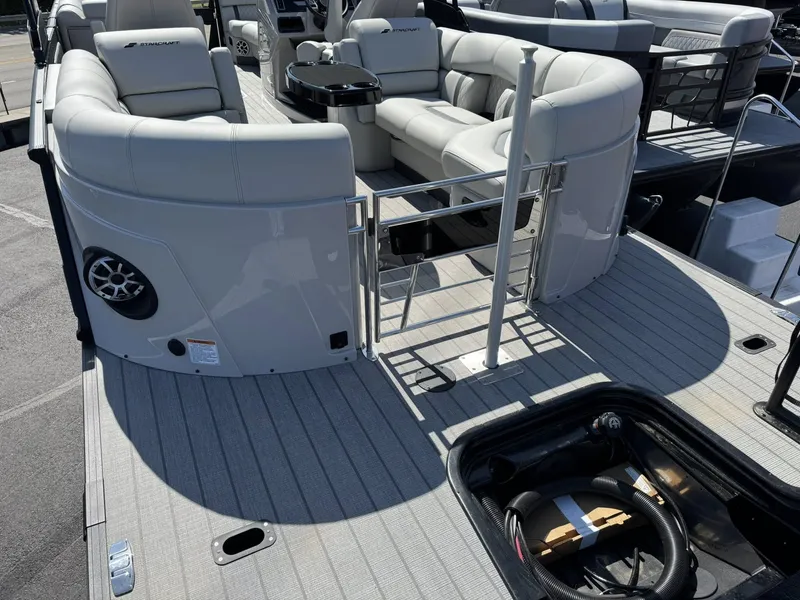 Slide: The Image of 2026 Starcraft RX 25 R DH pontoon boat with luxurious interior. - 26