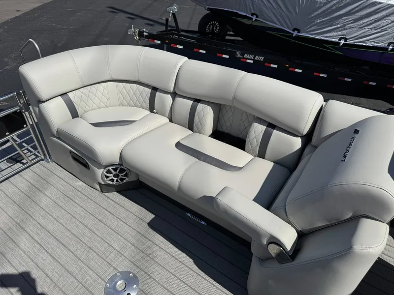 Slide: The Image of Luxurious seating in Starcraft RX 25 R DH boat, 2026 model. - 5