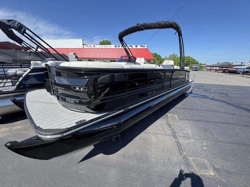 Slide: The Image of Starcraft RX 25 R DH 2026 pontoon boat on parking lot. - 9