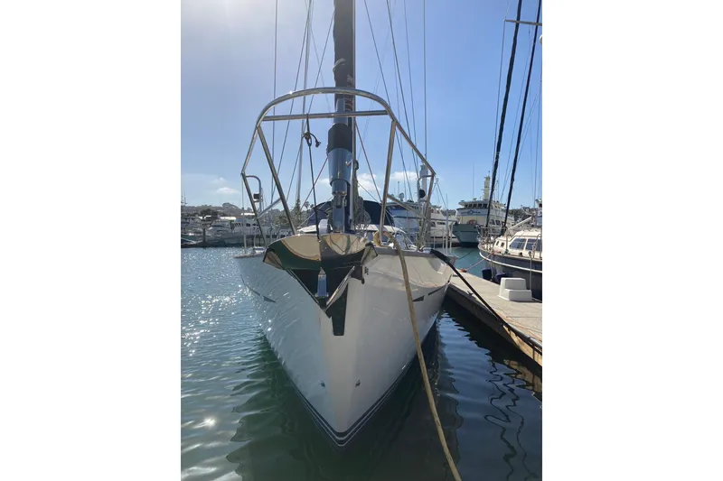 Slide: The Image of 2008 Oyster 56 Deck Saloon yacht docked in a sunny marina. - 3