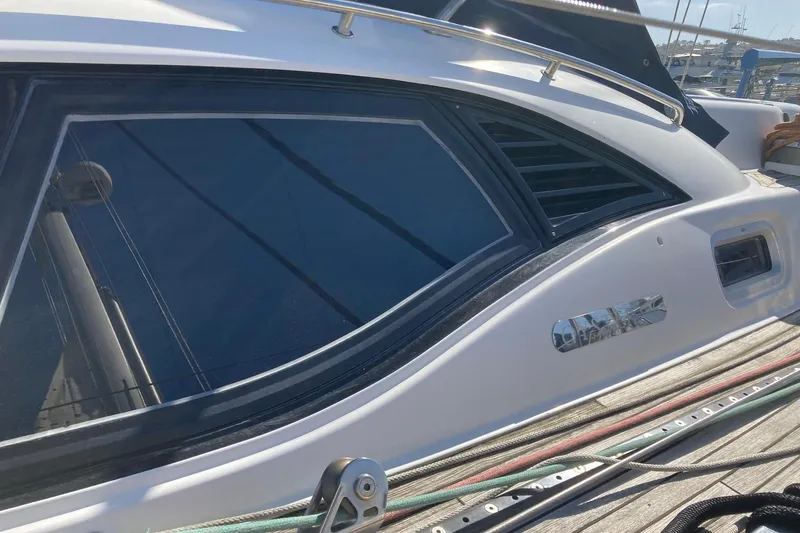 Slide: The Image of Close-up of 2008 Oyster 56 Deck Saloon yacht window and deck details. - 4