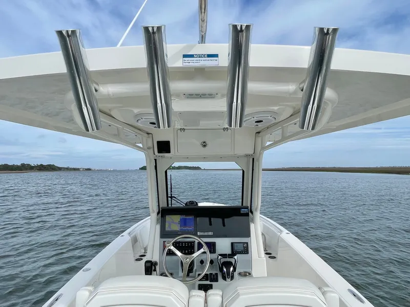 Slide: The Image of Interior view of 2022 Pursuit S 268 Sport on the water. - 15