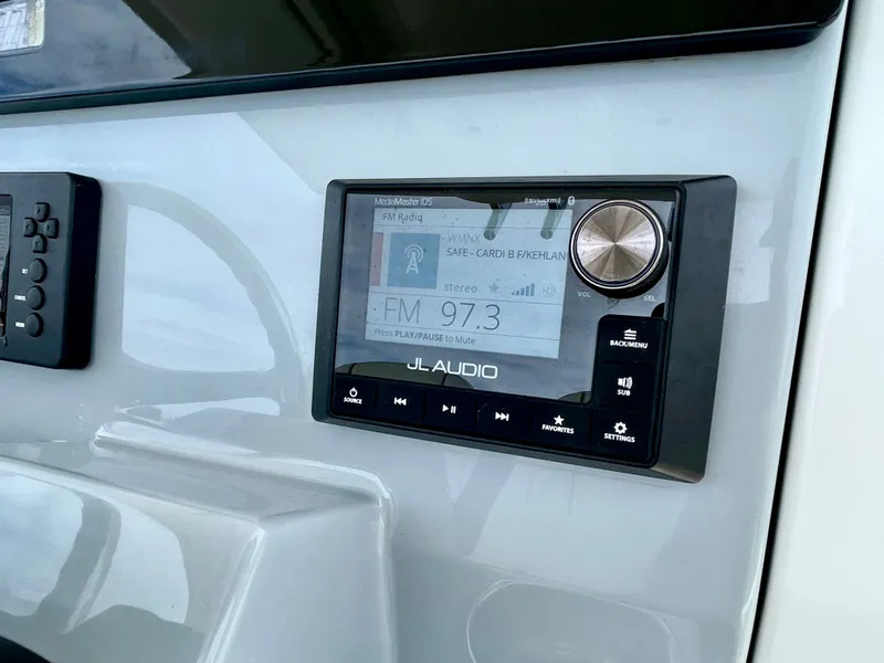Slide: The Image of JL Audio system in 2022 Pursuit S 268 Sport boat. - 20