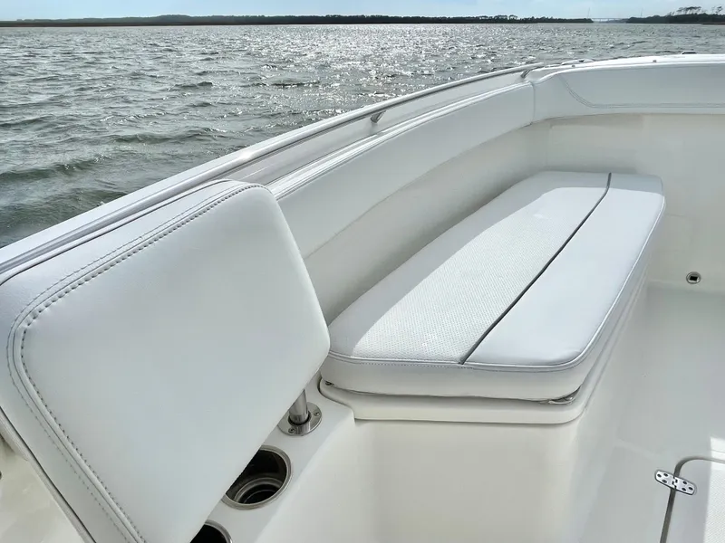 Slide: The Image of Interior view of 2022 Pursuit S 268 Sport with white seating. - 36