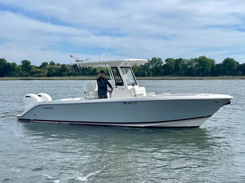 Slide: The Image of 2022 Pursuit S 268 Sport boat on calm water. - 7