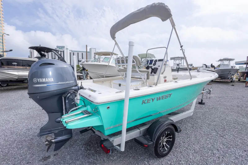 Slide: The Image of 2023 Key West 188 Bay Reef boat with Yamaha engine on display. - 11