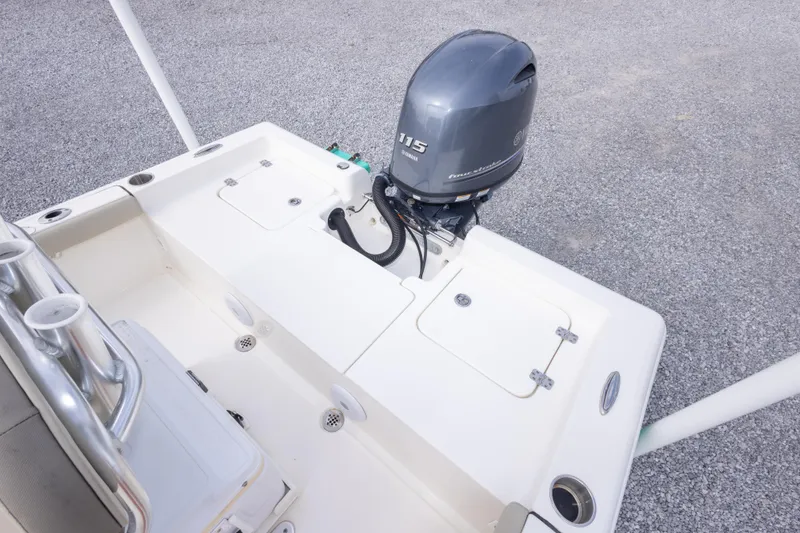 Slide: The Image of 2023 Key West 188 Bay Reef boat with Yamaha 115 outboard motor, rear deck view. - 18