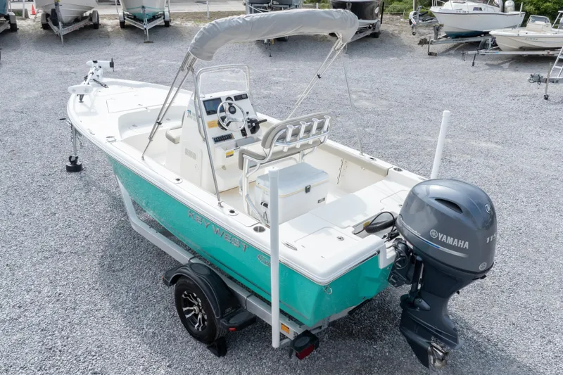 Slide: The Image of 2023 Key West 188 Bay Reef boat with Yamaha engine on gravel lot. - 36